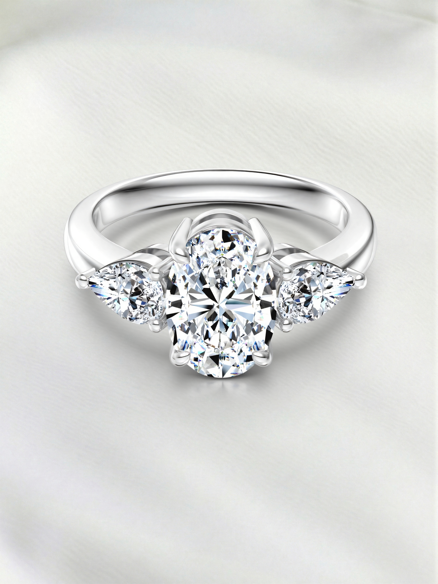 18K White Gold Plated Silver Oval & Pear Three Stone Moissanite Ring